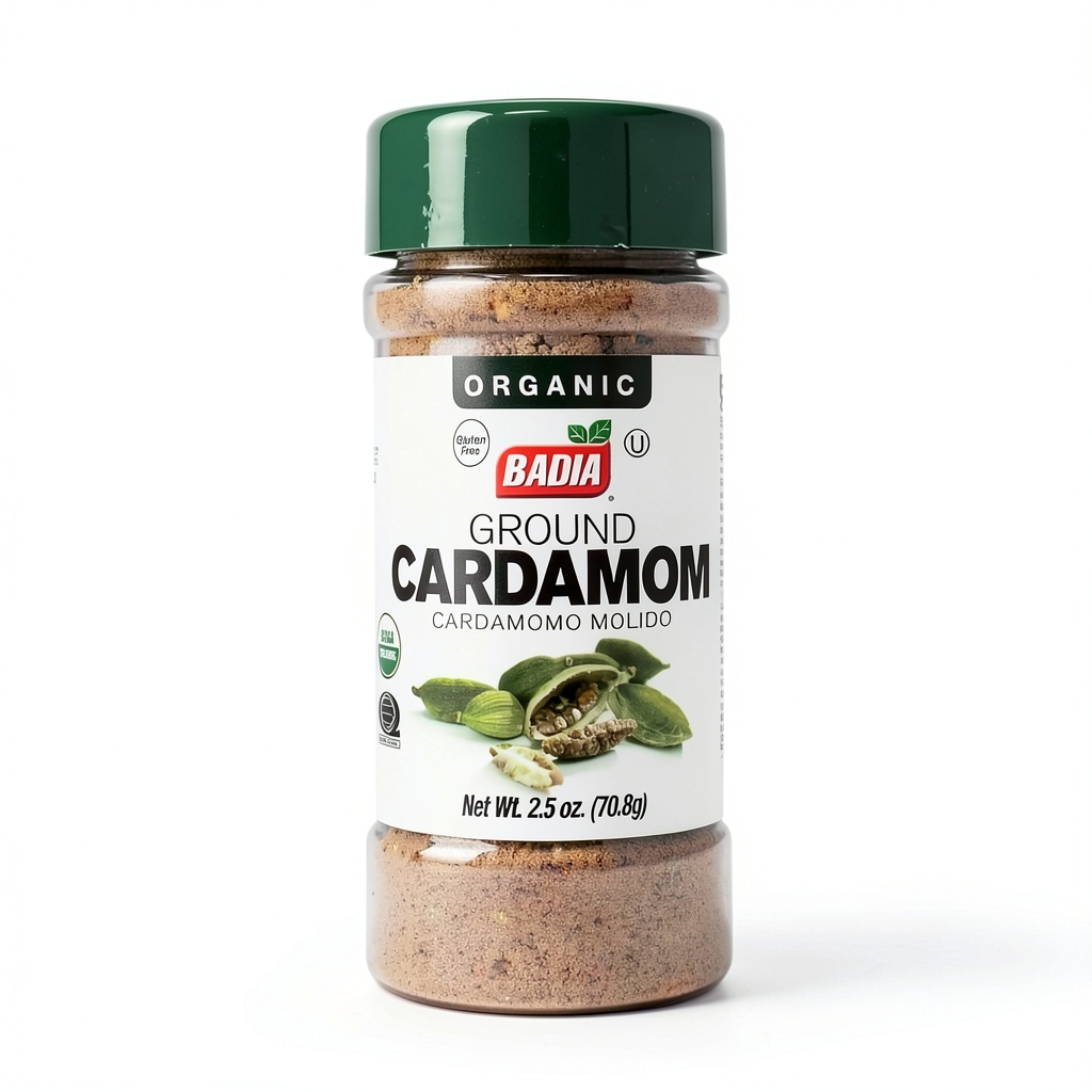Badia organic ground cardamom being added to a steaming cup of chai